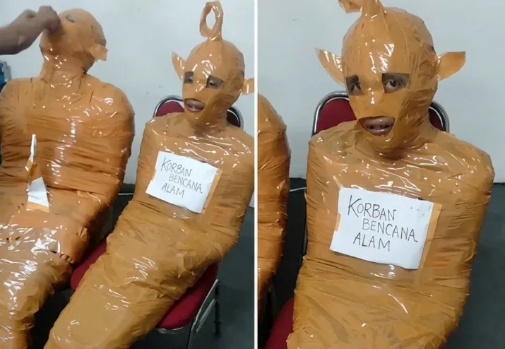 Disa persona të mbështjellë me nastro, të pretenduar si hajdutë